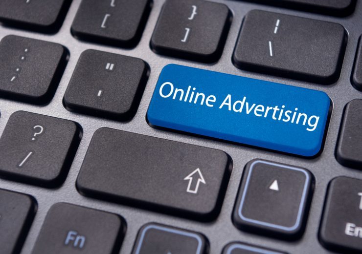 concepts of online advertising, with message on keyboard.
